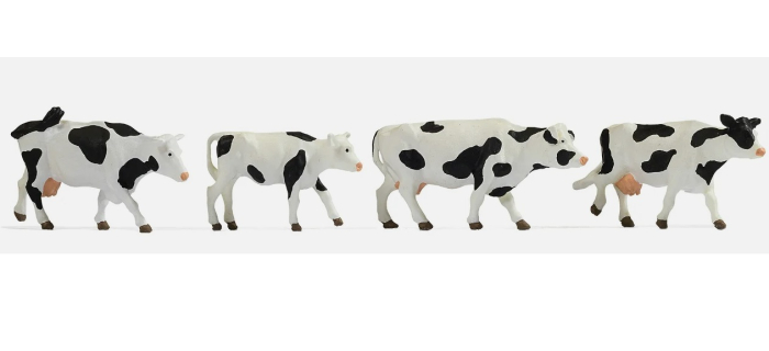 Vaches noires et blanches, figurines